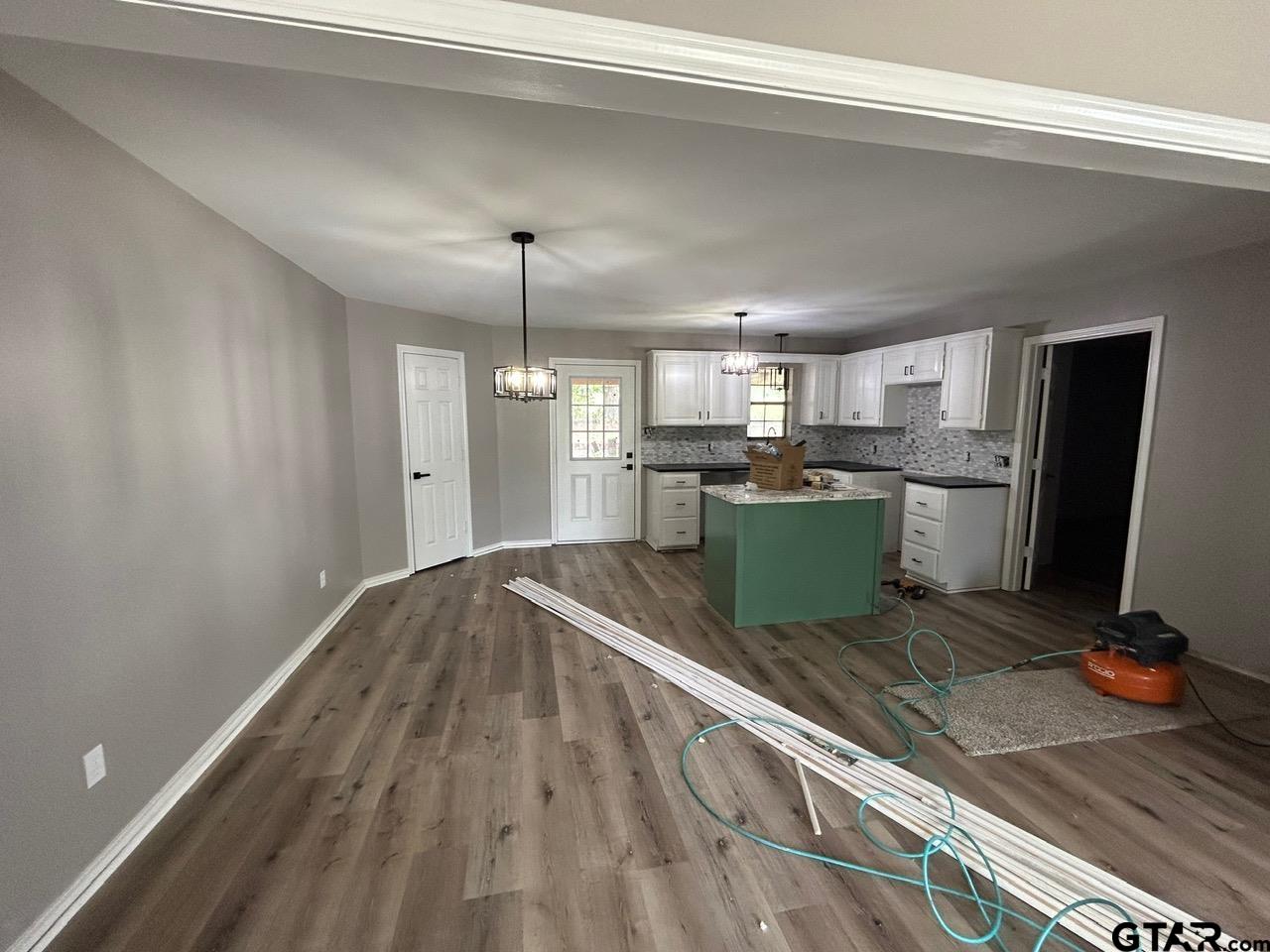 10052 Lakeshore Tyler, TX 75709 - Photo 7 of 28 a kitchen with stainless steel appliances granite countertop a refrigerator oven a sink and dishwasher