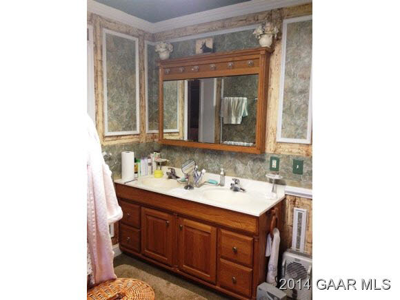 709 St James Road Fishersville, VA 22939 - Photo 7 of 18 a bathroom with a sink and a mirror