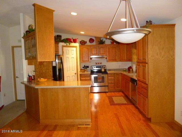 4702 North Razorback Drive Florence, AZ 85132 - Photo 15 of 36 Kitchen from Dining Area