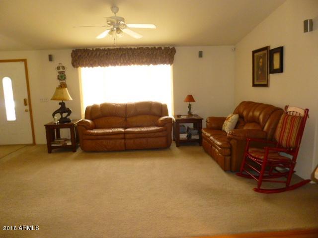 4702 North Razorback Drive Florence, AZ 85132 - Photo 9 of 36 Living Room View from Dining Area