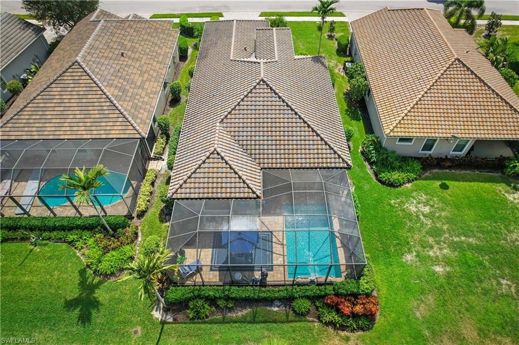 3585 Canopy Circle Naples, FL 34120 - Photo 3 of 46 a aerial view of a house