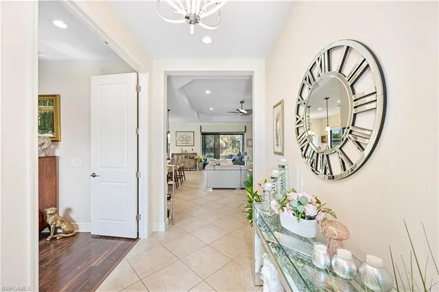 a view of an entryway with wooden floor