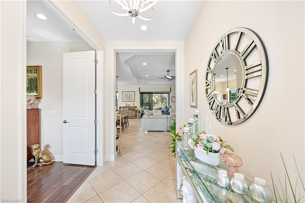 3585 Canopy Circle Naples, FL 34120 - Photo 32 of 46 a view of an entryway with wooden floor