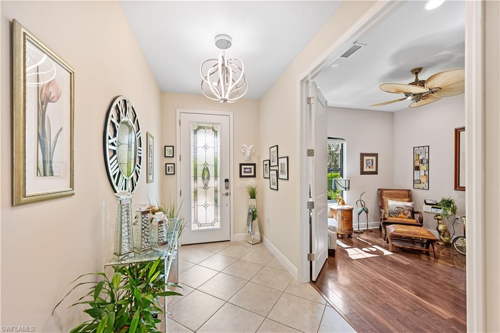 3585 Canopy Circle Naples, FL 34120 - Photo 33 of 46 a view of livingroom with furniture and wooden floor