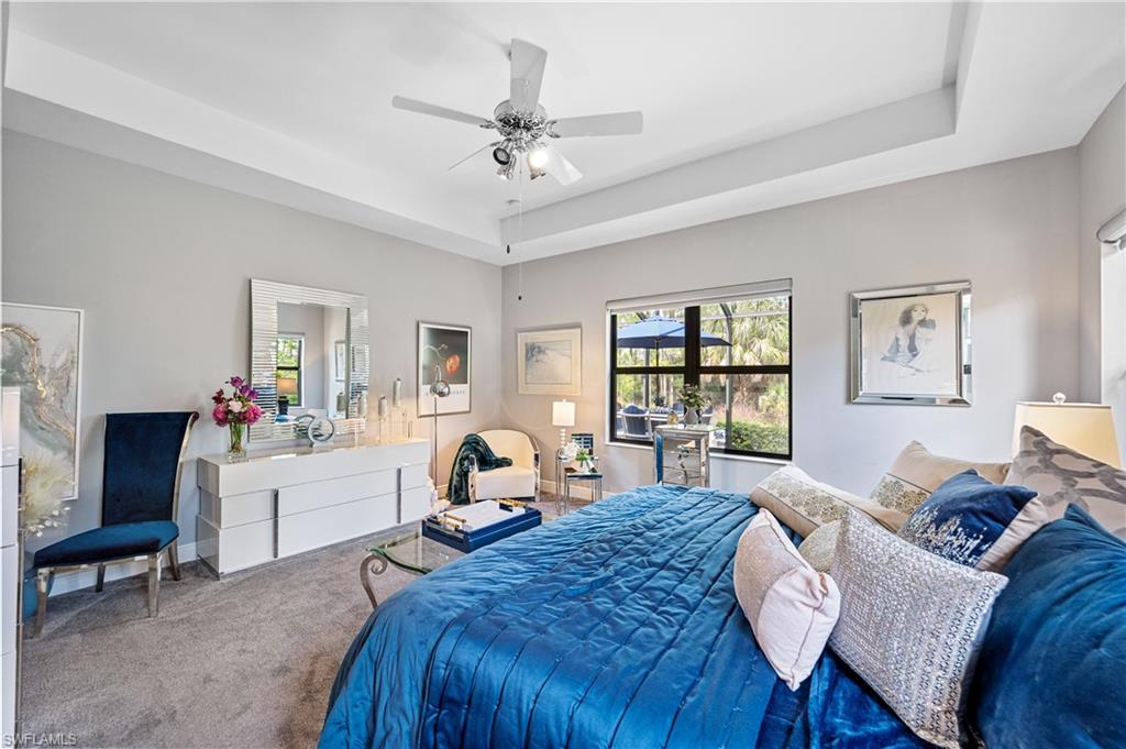 3585 Canopy Circle Naples, FL 34120 - Photo 34 of 46 a living room with furniture and a wooden floor