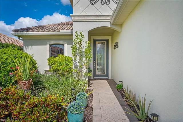 a front view of a house with a pathway