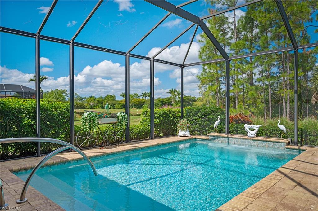 3585 Canopy Circle Naples, FL 34120 - Photo 9 of 46 a view of outdoor space with swimming pool
