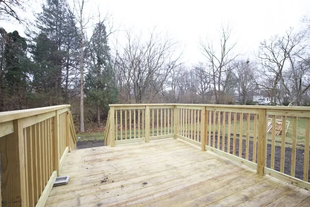 a view of a wooden fence