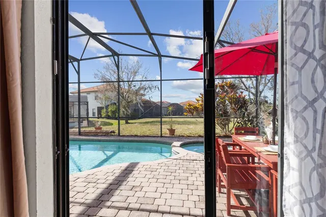 a bedroom with a bed and a filled with furniture