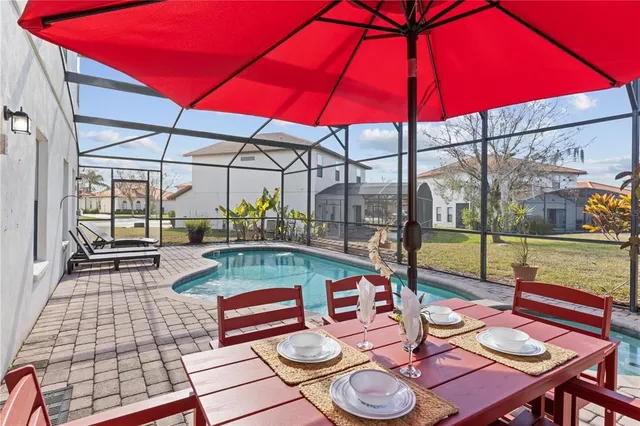 a bedroom with a bed and flat screen tv