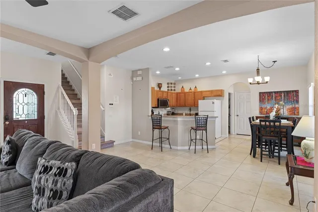 a view of swimming pool with outdoor seating