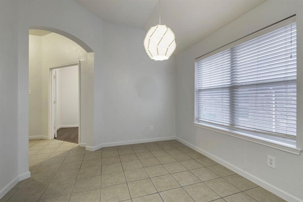 448 Northbrook Avenue Oak Point, TX 75068 - Photo 5 of 12 an empty room with a window