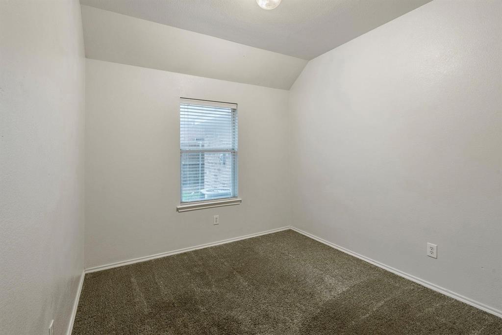 448 Northbrook Avenue Oak Point, TX 75068 - Photo 8 of 12 an empty room with a window