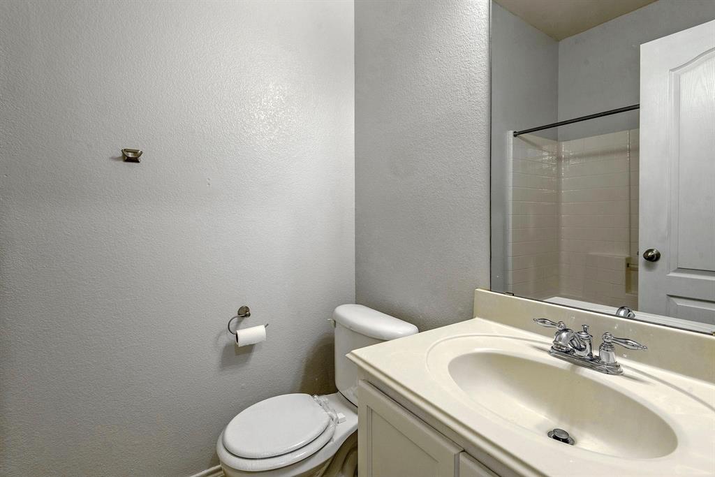 448 Northbrook Avenue Oak Point, TX 75068 - Photo 9 of 12 a bathroom with a sink toilet and mirror