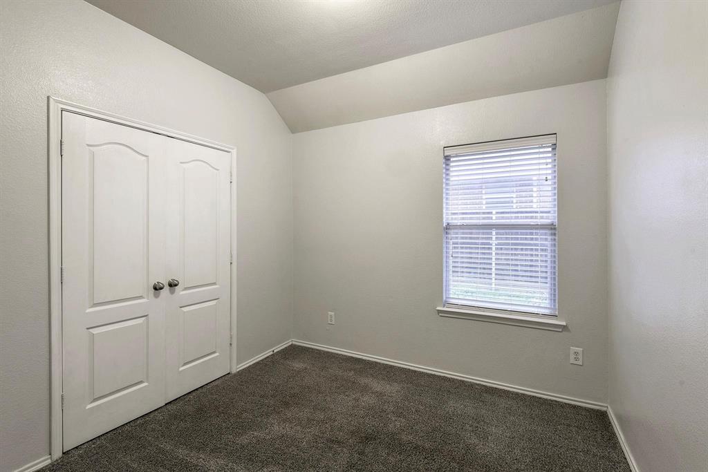 448 Northbrook Avenue Oak Point, TX 75068 - Photo 10 of 12 an empty room with windows