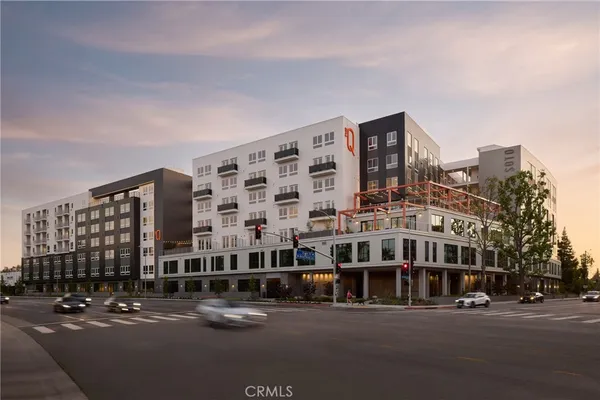 a tall building sitting on the side of a street