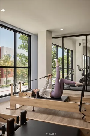 a view of a building with garden and tall buildings