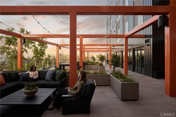 a dinning table and chairs in the patio