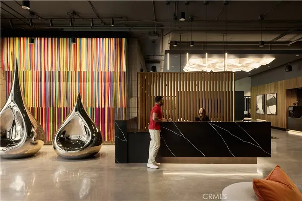 a view of roof deck with furniture