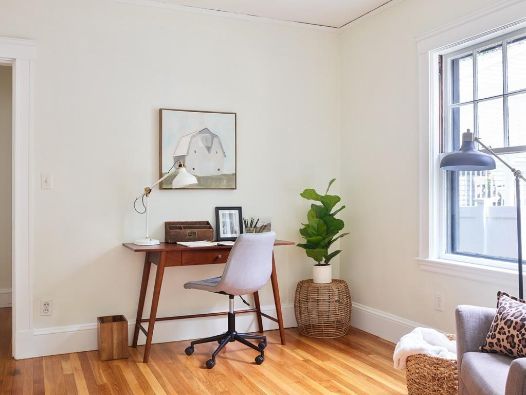18 Bonad Road Arlington, MA 02476 - Photo 11 of 23 a view of a workspace with furniture and a potted plant