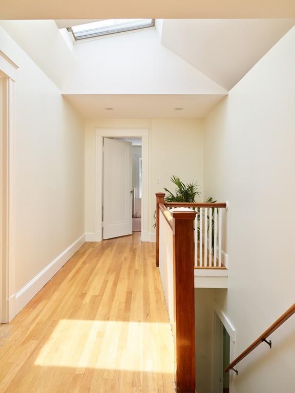 18 Bonad Road Arlington, MA 02476 - Photo 13 of 23 a bedroom with a bed and a mirror