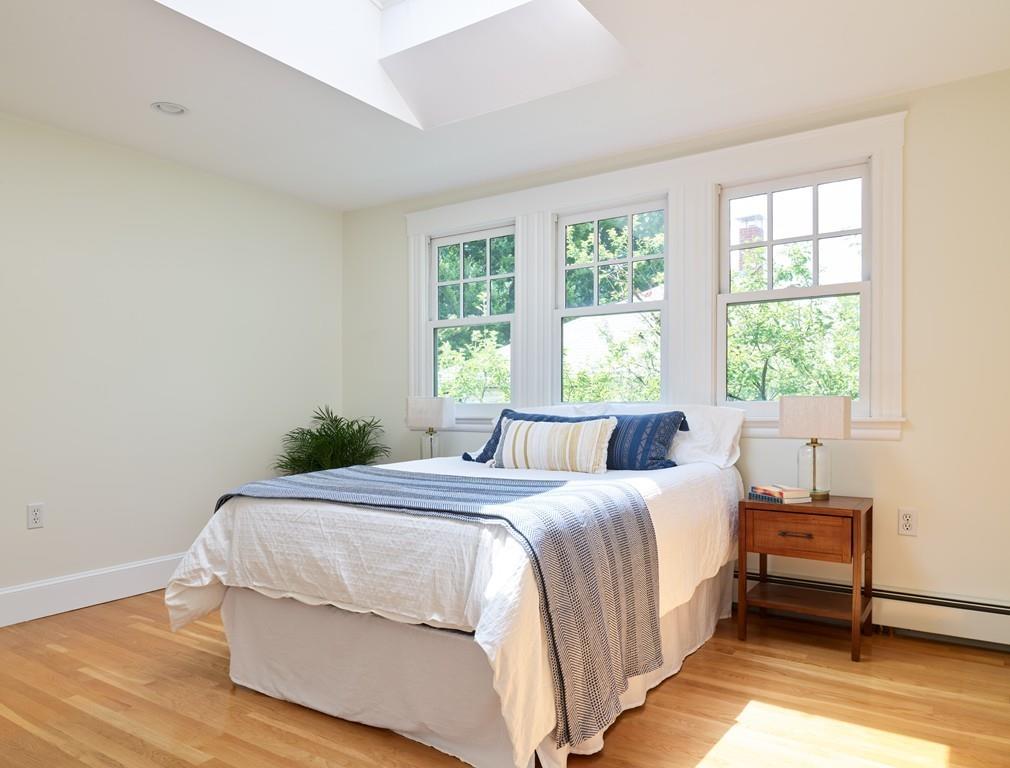 18 Bonad Road Arlington, MA 02476 - Photo 14 of 23 a bedroom with a bed and a window