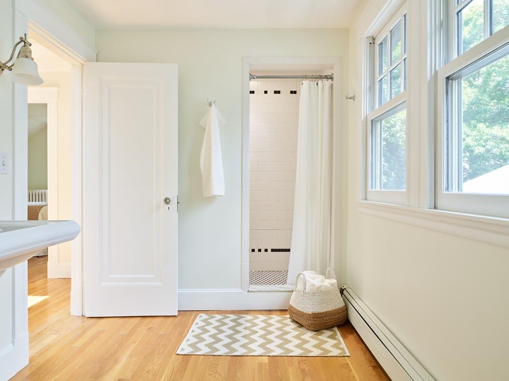 18 Bonad Road Arlington, MA 02476 - Photo 16 of 23 a bathroom with a window and a shower