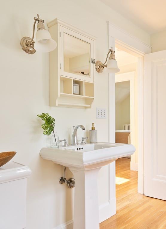 18 Bonad Road Arlington, MA 02476 - Photo 17 of 23 a bathroom with a sink and a mirror