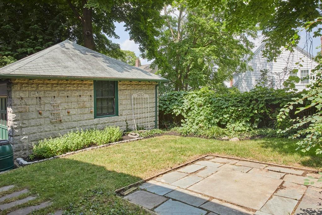 18 Bonad Road Arlington, MA 02476 - Photo 20 of 23 a front view of a house with a yard