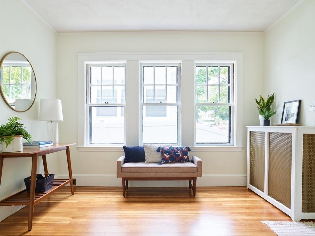 18 Bonad Road Arlington, MA 02476 - Photo 2 of 23 a living room with furniture and a window