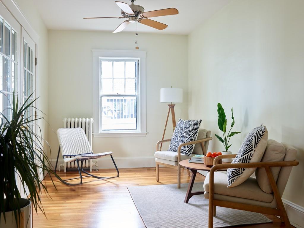 18 Bonad Road Arlington, MA 02476 - Photo 9 of 23 a living room with furniture and a window