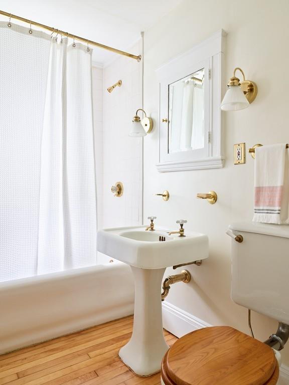 18 Bonad Road Arlington, MA 02476 - Photo 10 of 23 a bathroom with a sink and a mirror