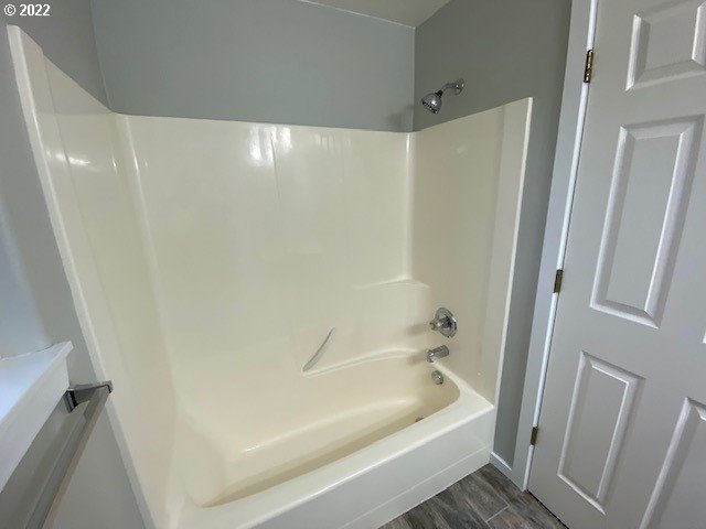 37227 Solso Road Sandy, OR 97055 - Photo 20 of 28 a bathroom with a tub and shower