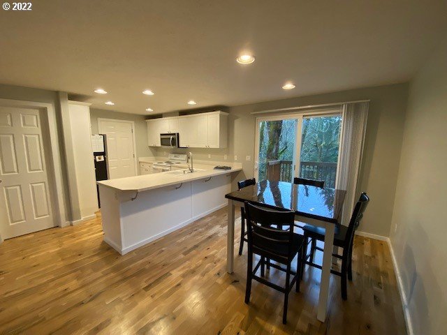 37227 Solso Road Sandy, OR 97055 - Photo 7 of 28 a kitchen with a table and chairs in it