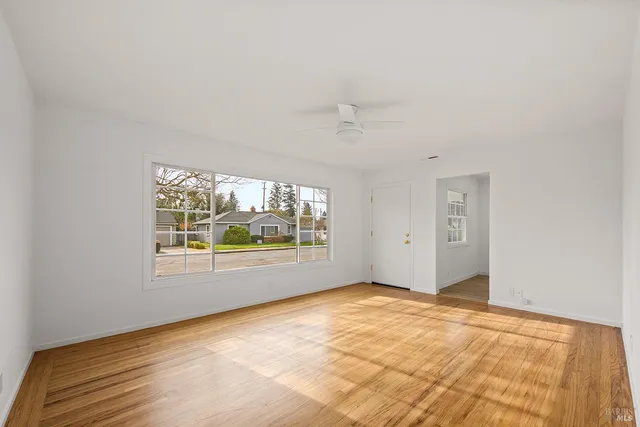a view of kitchen with wooden floor