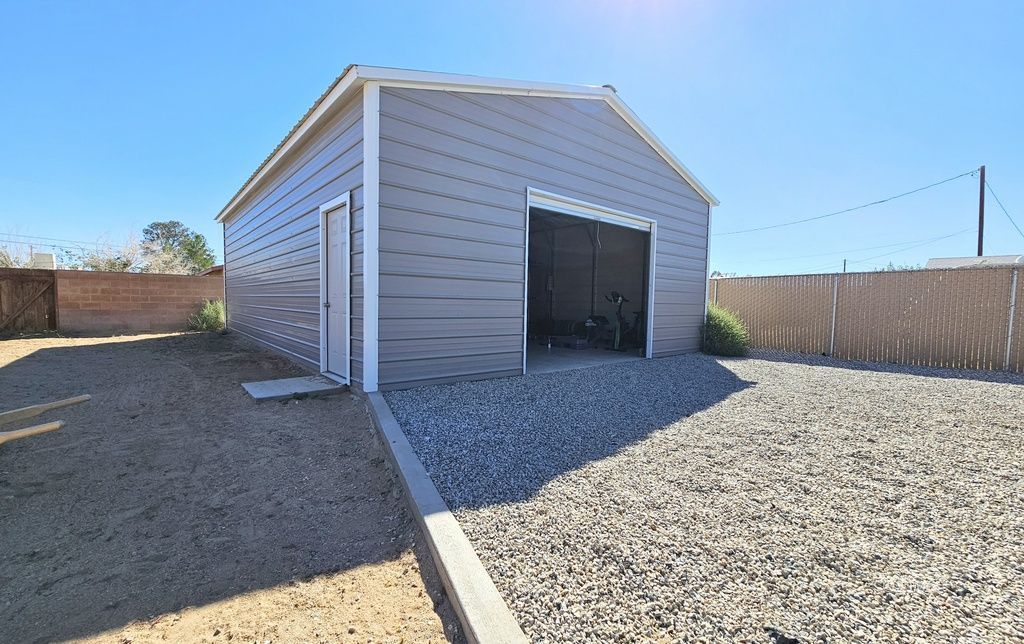 630 South Sunset Street Ridgecrest, CA 93555 - Photo 23 of 34 a view of a backyard of the house