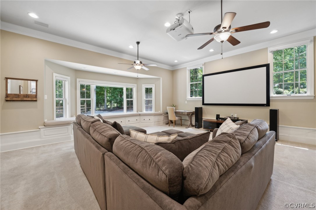 5550 Quail Ridge Terrace Chesterfield, VA 23832 - Photo 17 of 44 a living room with furniture ceiling fan and a flat screen tv