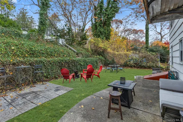 a backyard of a house with seating space