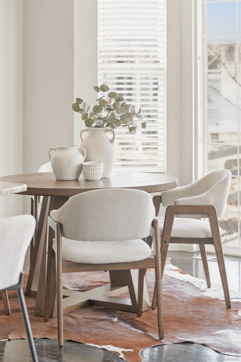 1150 Mircos Street Erie, CO 80516 - Photo 11 of 46 a dining room with furniture and window