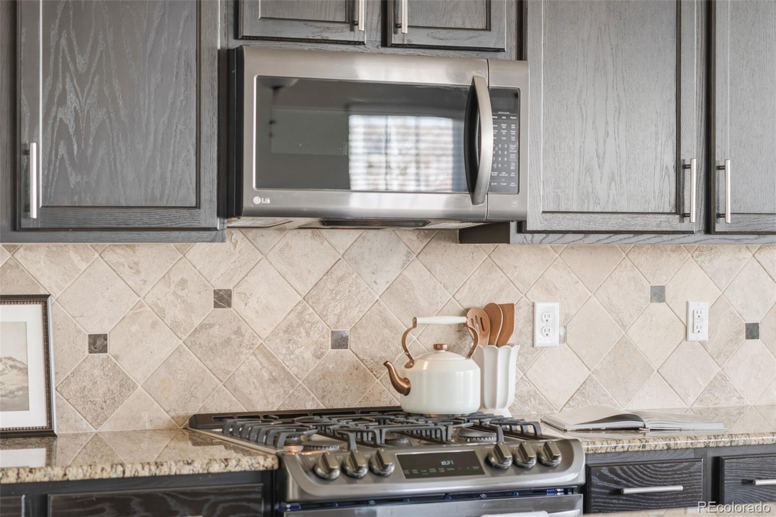 1150 Mircos Street Erie, CO 80516 - Photo 13 of 46 a view of a stove with window