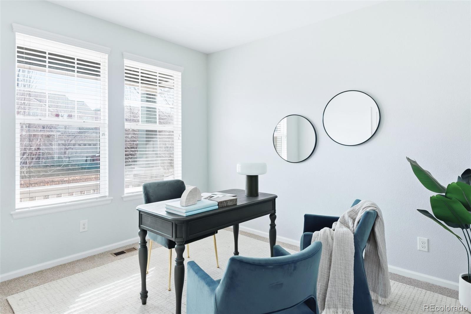 1150 Mircos Street Erie, CO 80516 - Photo 17 of 46 a dining room with furniture and a window