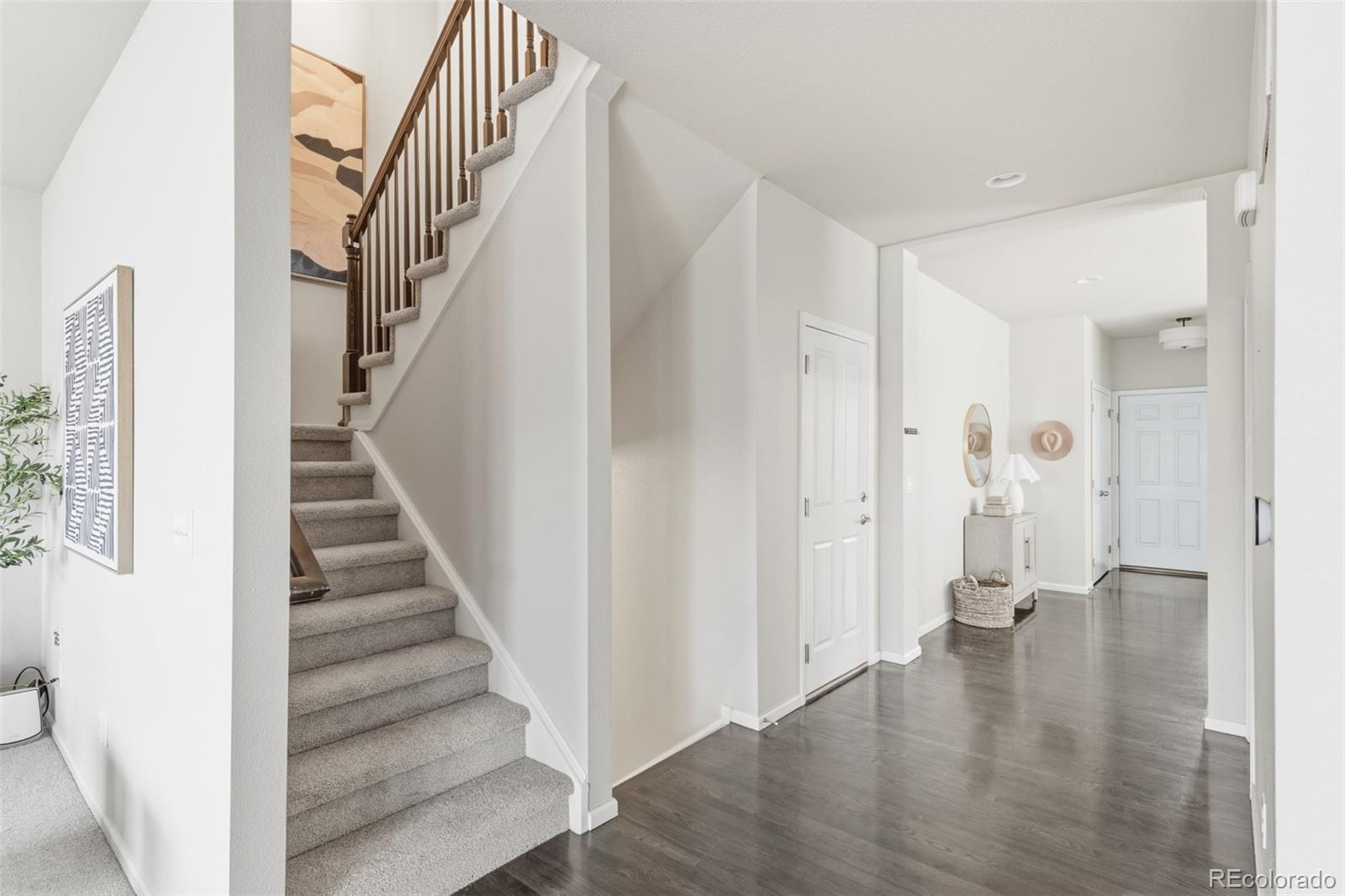 1150 Mircos Street Erie, CO 80516 - Photo 18 of 46 a view of an entryway with wooden floor