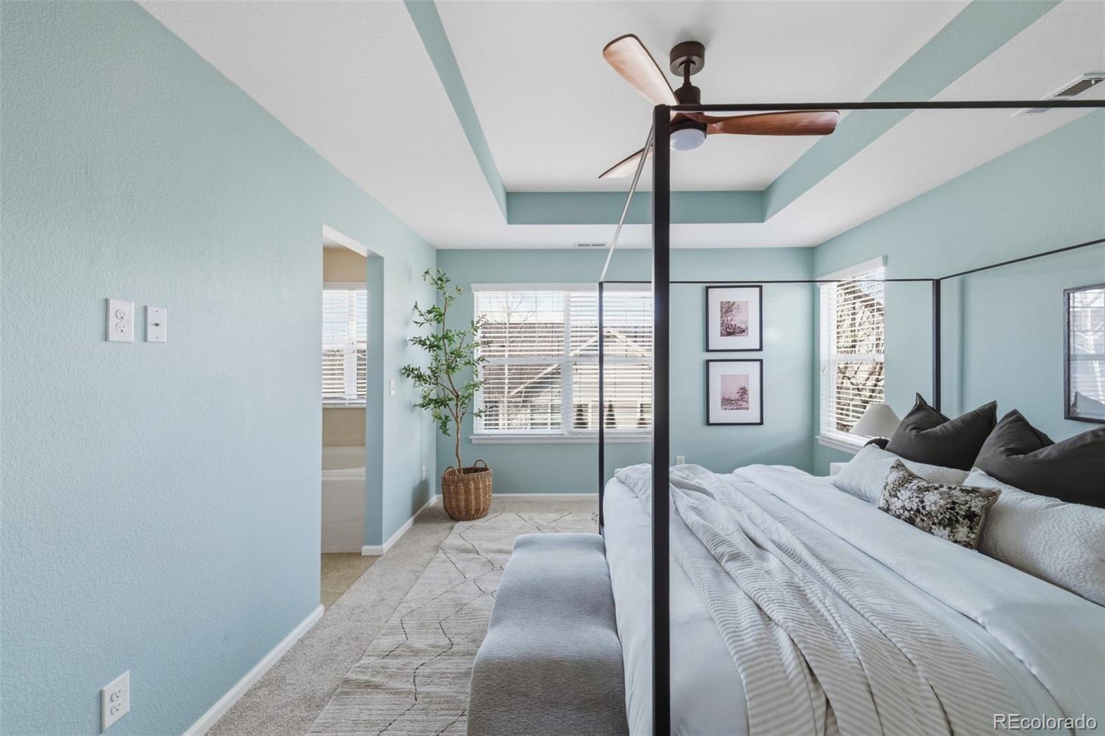 1150 Mircos Street Erie, CO 80516 - Photo 20 of 46 a bedroom with a large bed and a window
