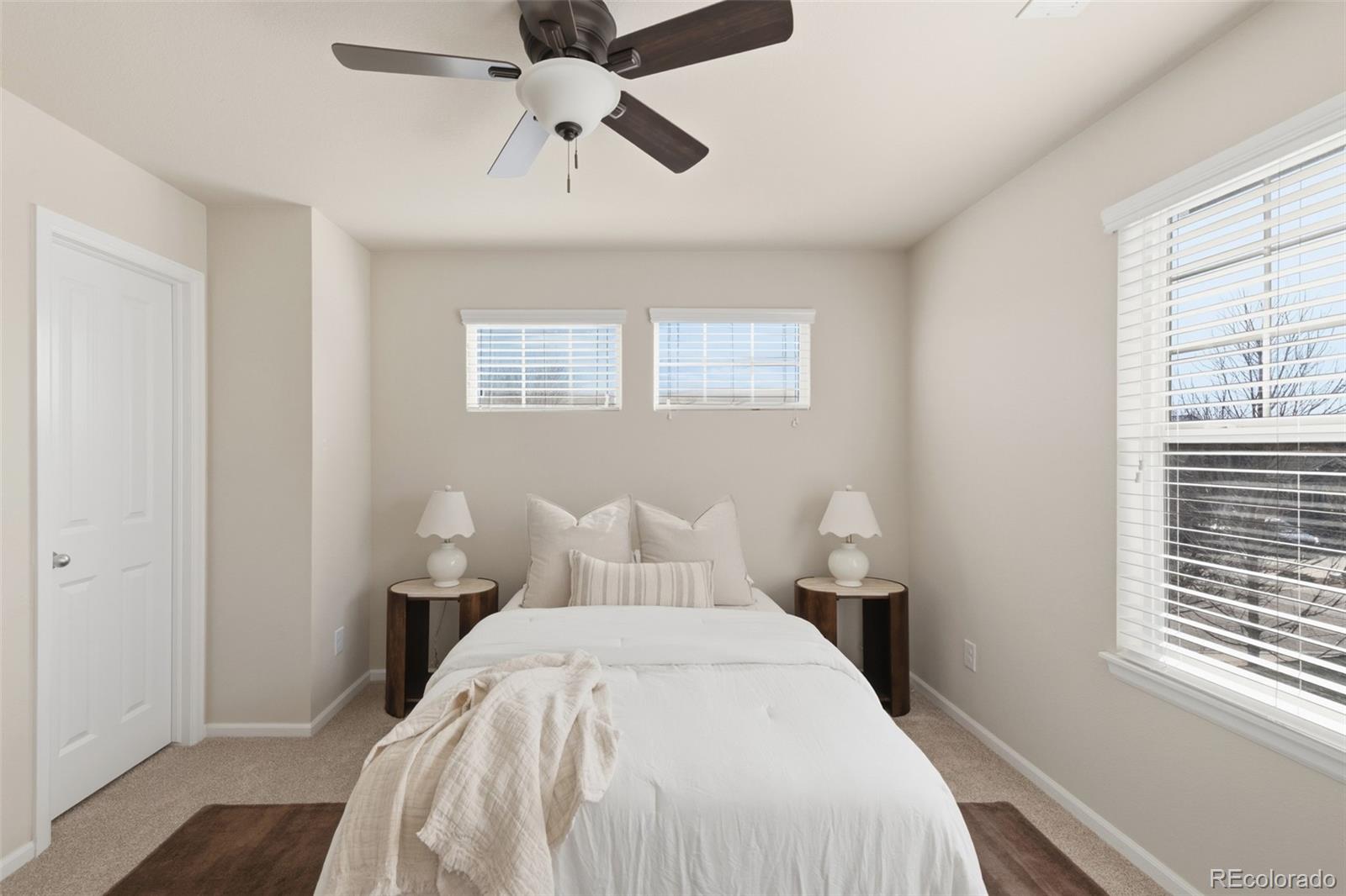 1150 Mircos Street Erie, CO 80516 - Photo 24 of 46 a bedroom with a bed and a window