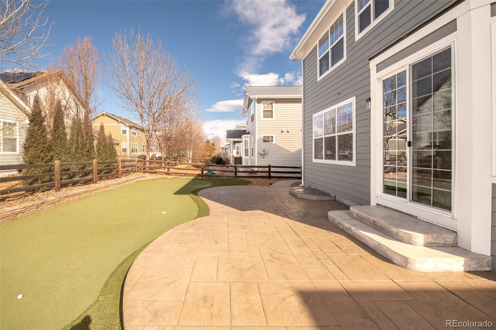 1150 Mircos Street Erie, CO 80516 - Photo 29 of 46 a view of a swimming pool with outdoor seating