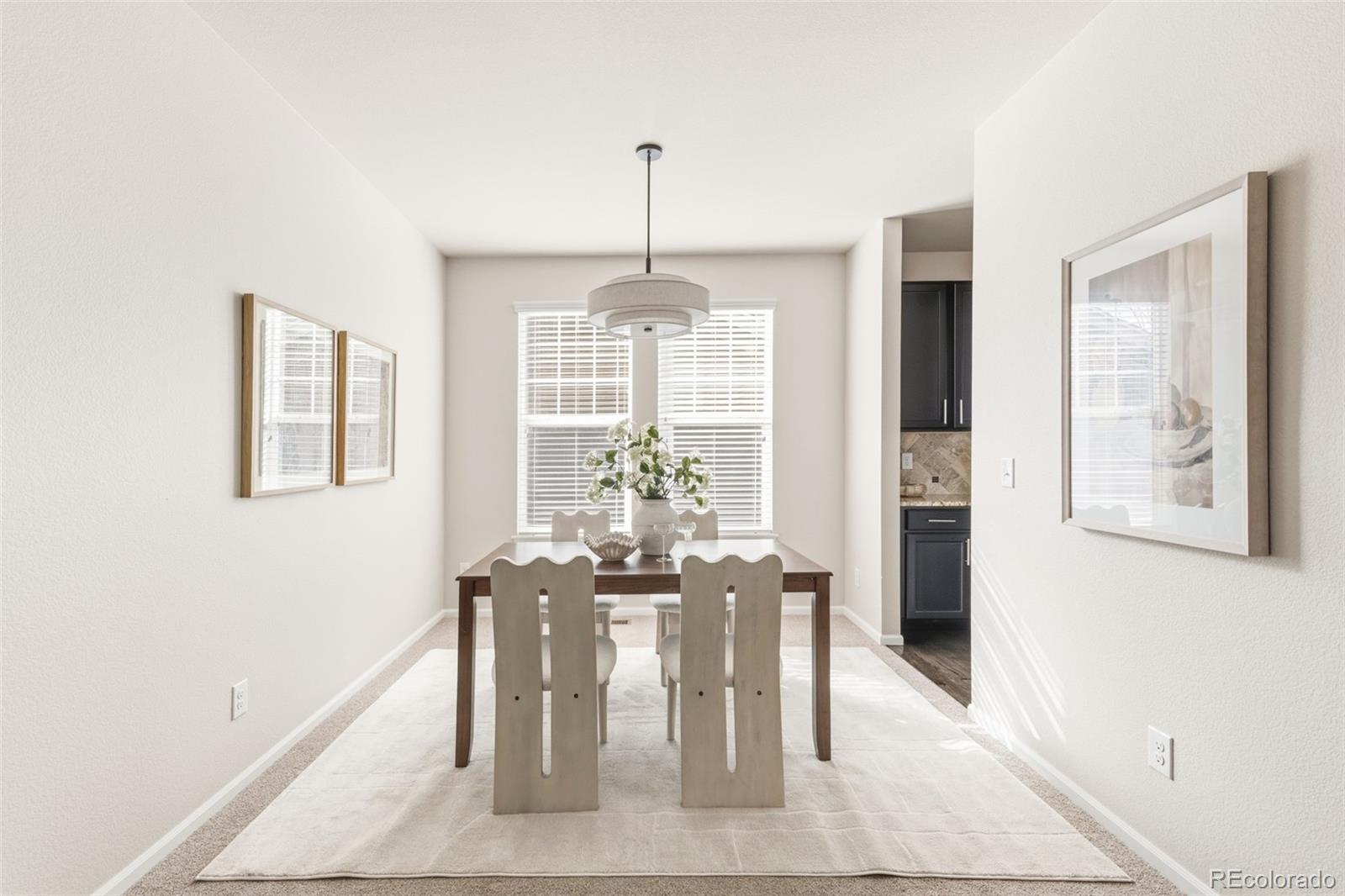 1150 Mircos Street Erie, CO 80516 - Photo 3 of 46 a view of a dining room with furniture and window