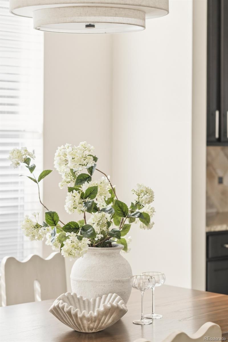 1150 Mircos Street Erie, CO 80516 - Photo 4 of 46 a vase of flowers sitting on a table