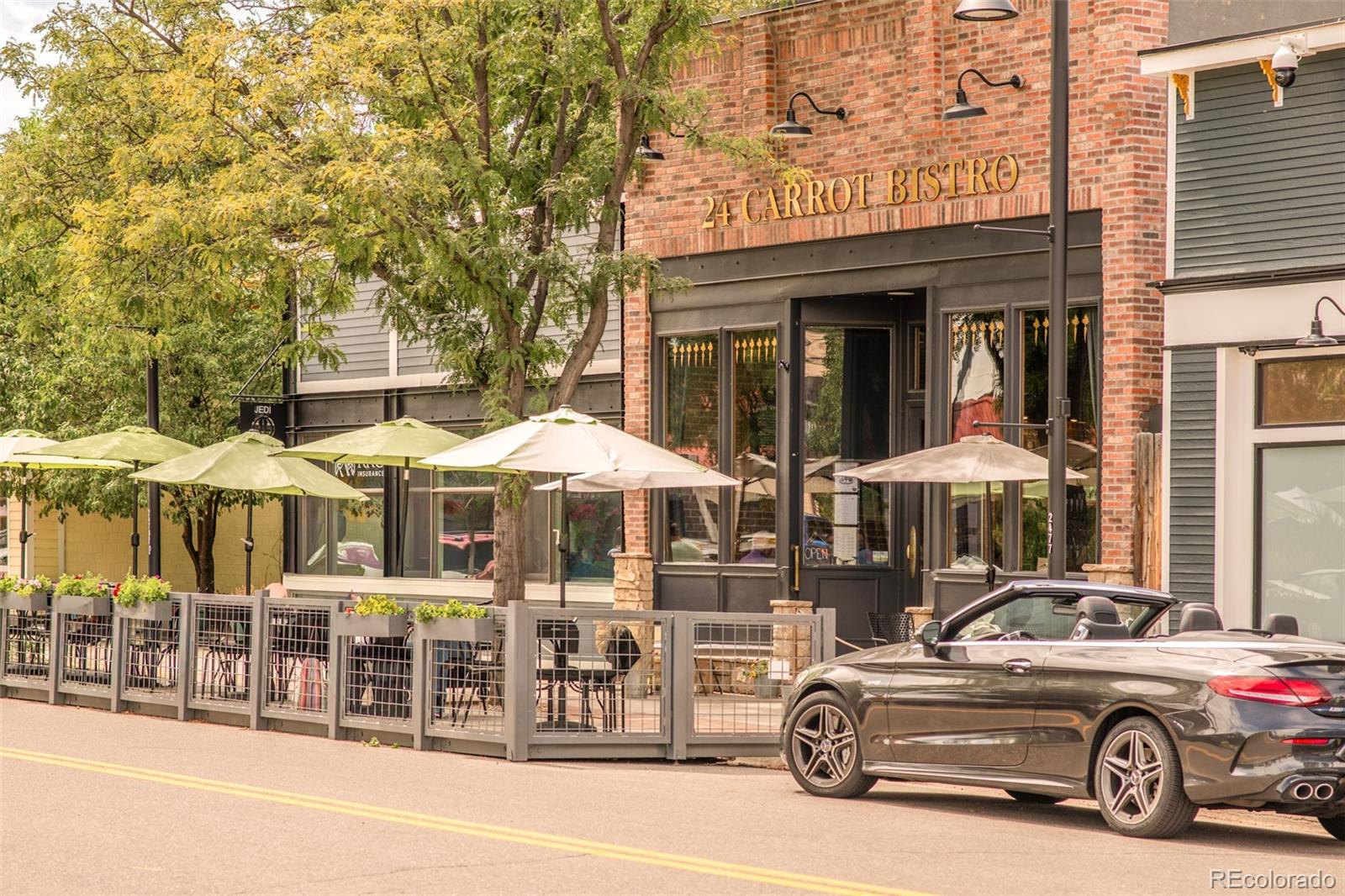 1150 Mircos Street Erie, CO 80516 - Photo 43 of 46 a car parked in front of a building