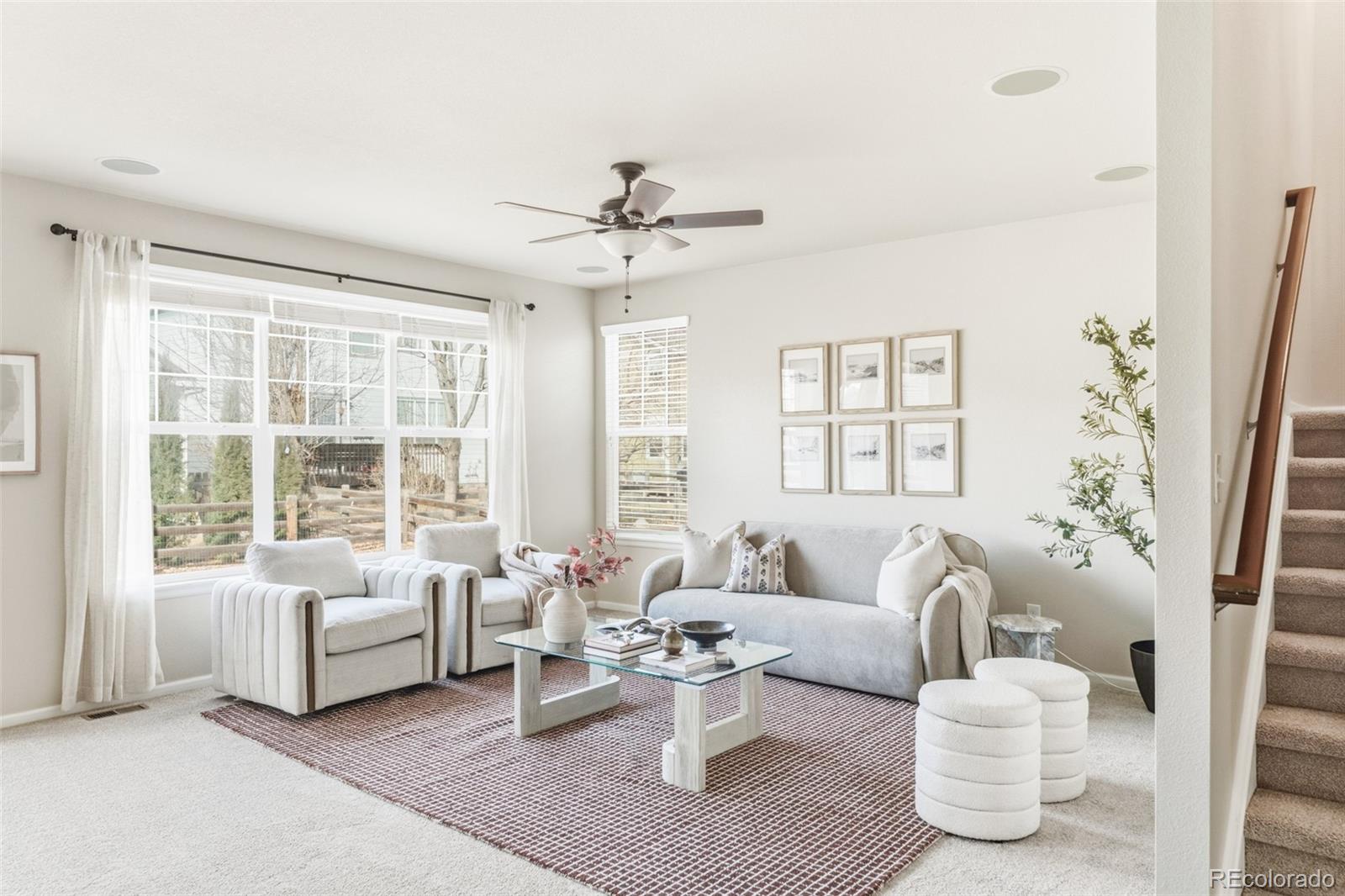 1150 Mircos Street Erie, CO 80516 - Photo 7 of 46 a living room with furniture and a large window