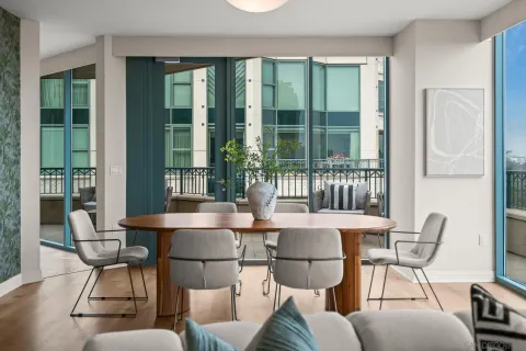 a view of a balcony with furniture